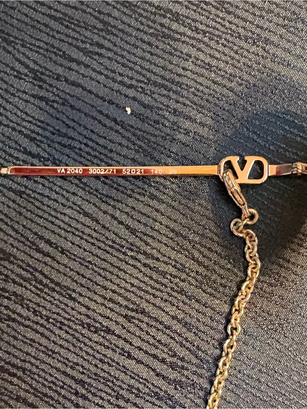 Valentino Garavani Octagonal Metal Sunglasses with a gold Vlogo chain